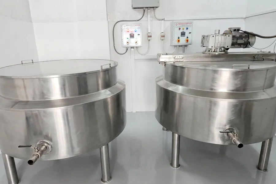Stainless-steel processing kettles at the Prabhat factory in Amritsar